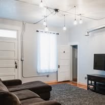 Living room with string pendant lights